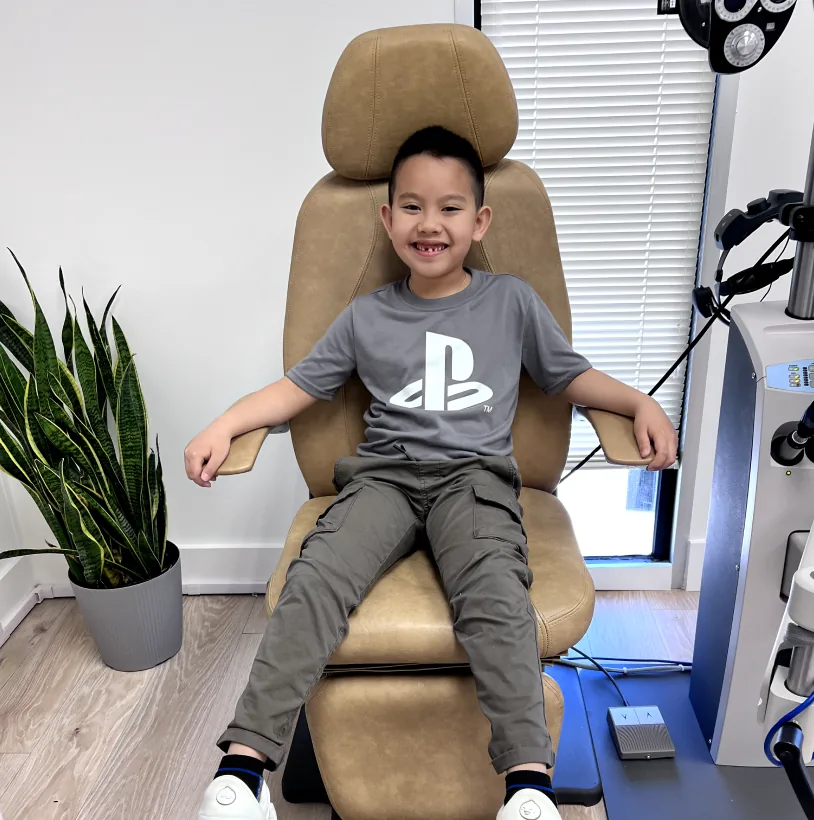 Doctor performing pediatric myopia evaluation at Charlotte Contact Lens Institute