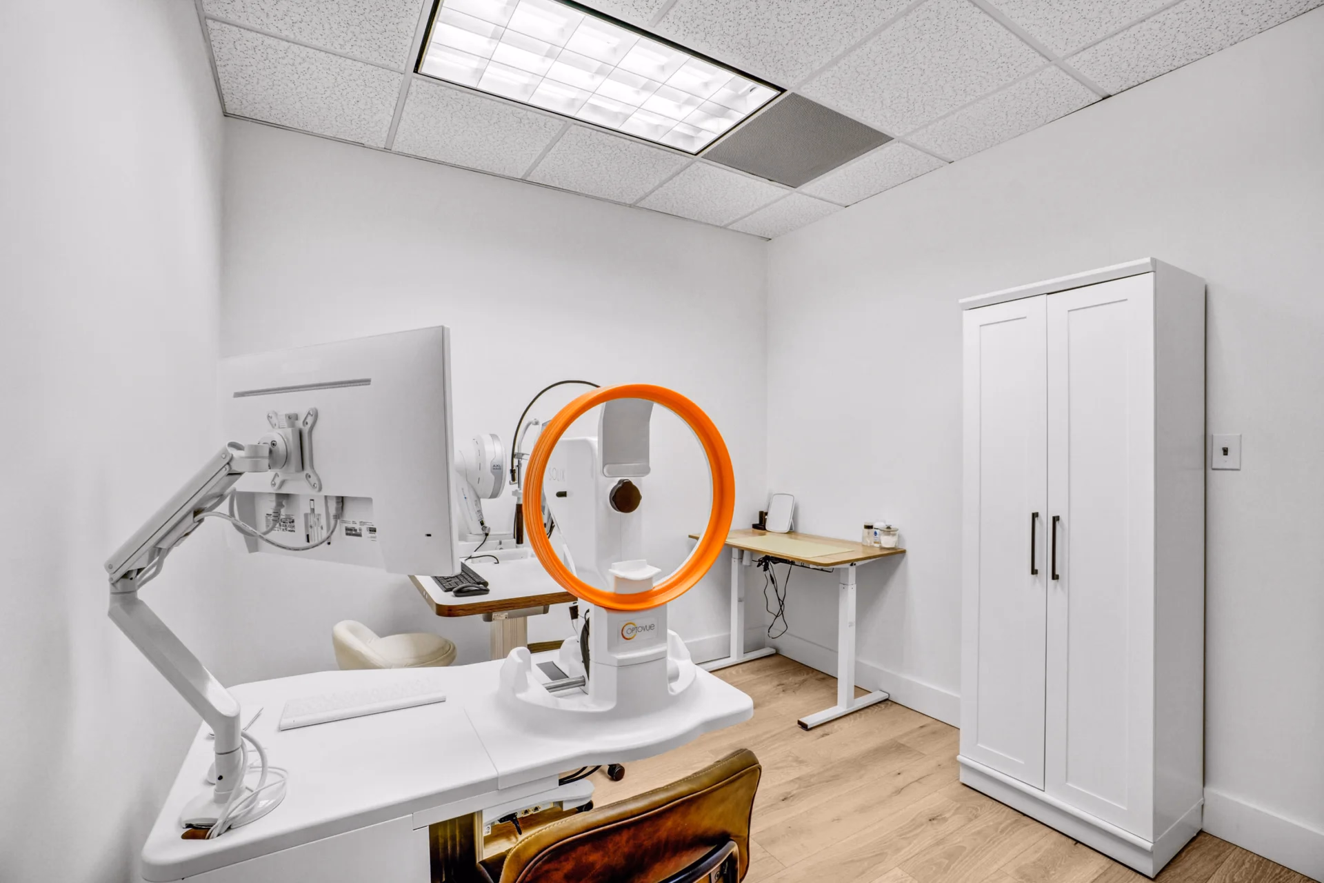 Diagnostic room with corneal imaging and examination equipment