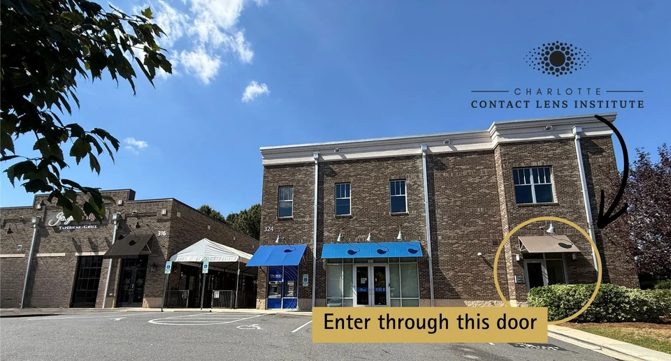 Charlotte Contact Lens Institute building with an arrow and gold circle marking the right-hand entrance. Enter through this door.