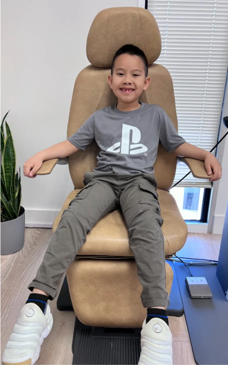 Young boy swimming freely without glasses after overnight Orthokeratology treatment