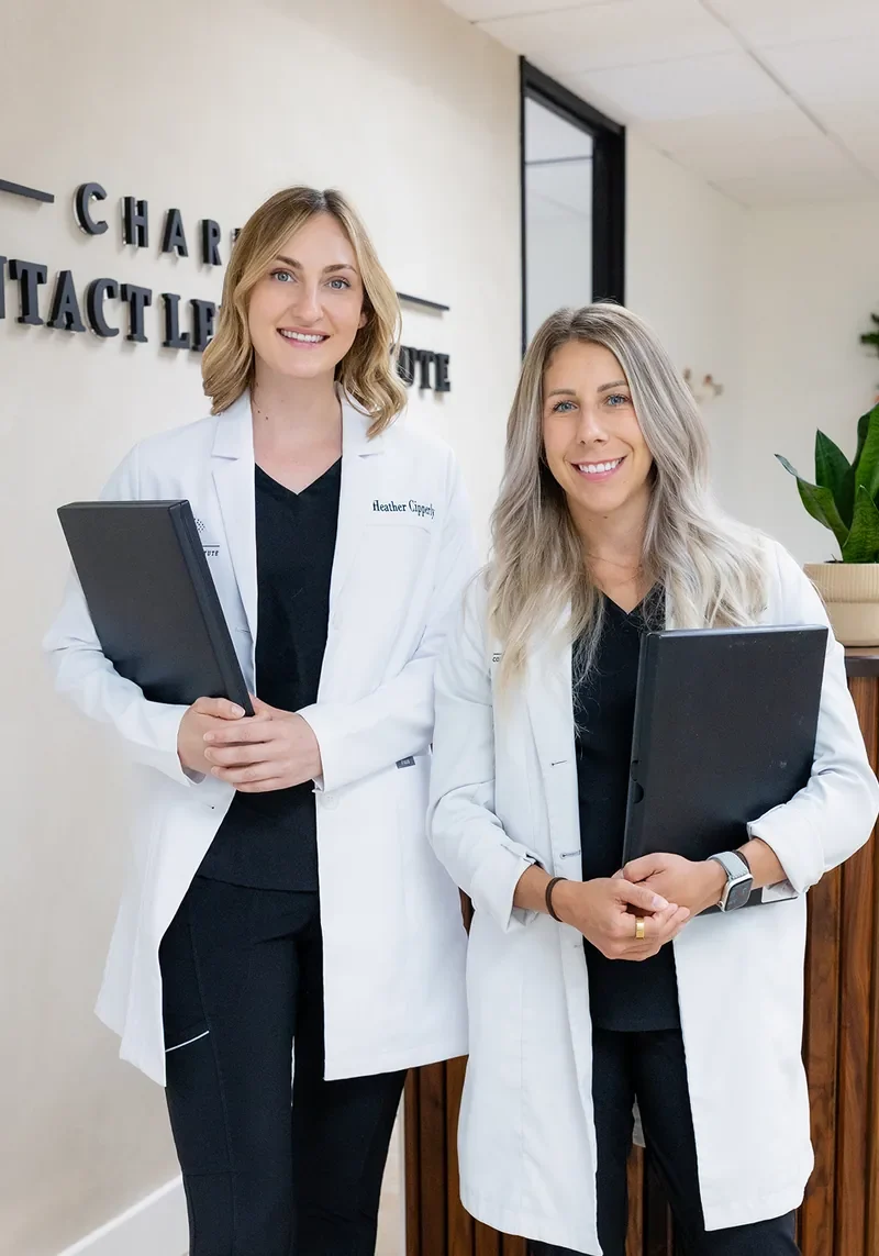 Doctor administering specialized therapeutic contact lens treatment at Charlotte Contact Lens Institute
